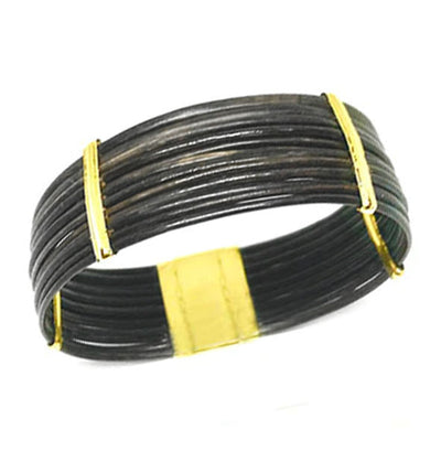 pulsera-ancha-plana-pelo-bufalo-en-oro-18-kilates-foto-1