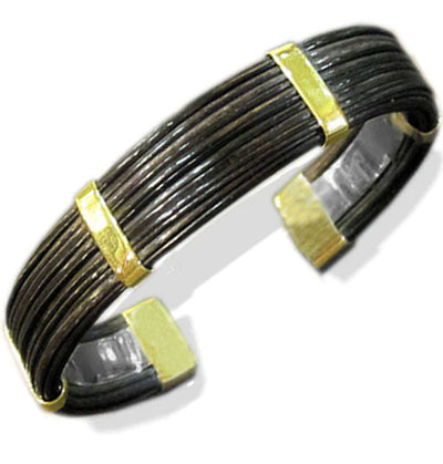 pulsera-ancha-plana-pelo-bufalo-en-oro-18-kilates-y-base-plata-foto-1