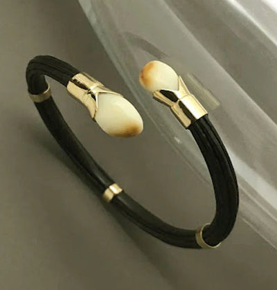 pulsera-cruzada-perla-venado-con-oro-18-kilates-y-pelo-de-bufalo-africano-1