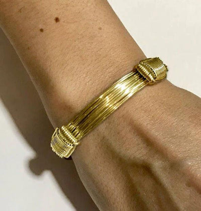 pulsera-nudos-corredizos-9-hilos-en-oro-18-kilates-1