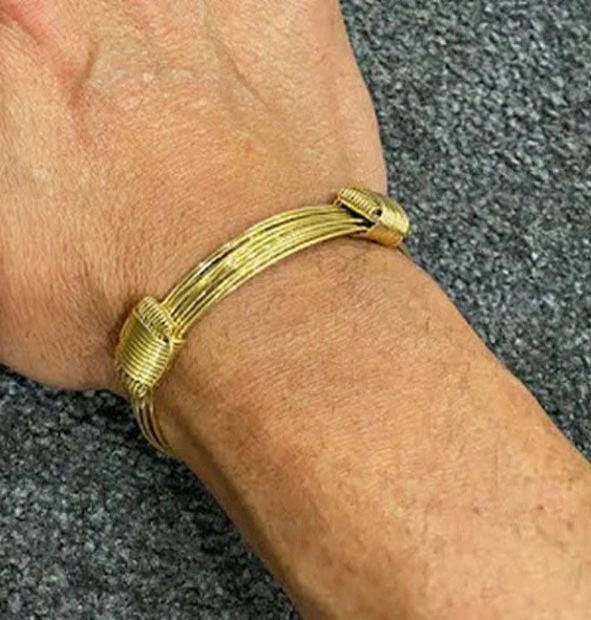 pulsera-nudos-corredizos-9-hilos-en-oro-18-kilates