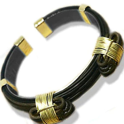 pulsera-plana-pelo-bufalo-con-2-nudos-atados-en-oro-18-kilates-y-base-plata-foto-3