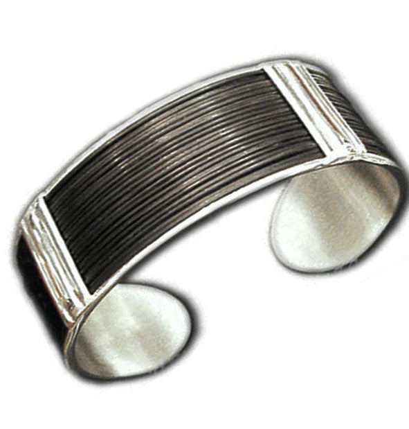 pulsera-rigida-ancha-con-pelo-de-bufalo-y-plata-foto-1