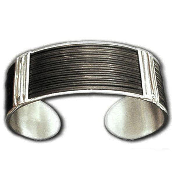 pulsera-rigida-ancha-con-pelo-de-bufalo-y-plata