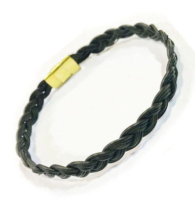 pulsera-trenza-pelo-bufalo-en-oro-18-kilates